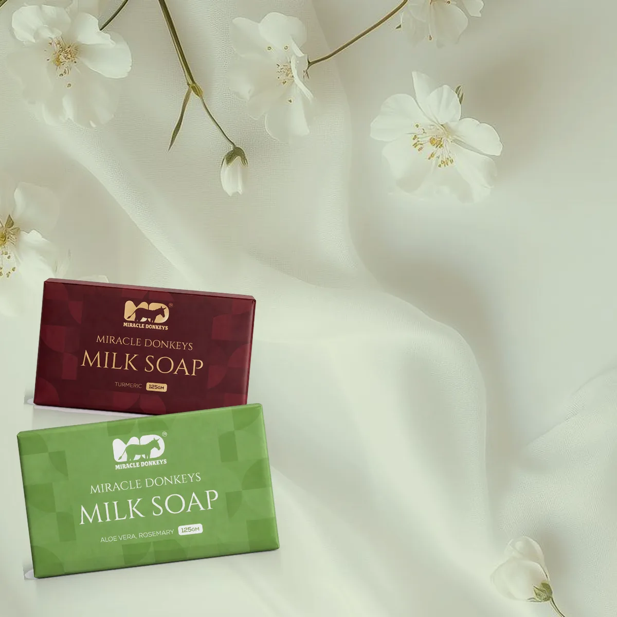 Aloe Vera & Rosemary and Turmeric donkey milk soap packs on sage silk